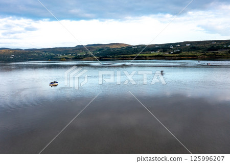 Jetski stuck in Gweebarra bay between Portnoo and Lettermacaward, County Donegal - Ireland 125996207