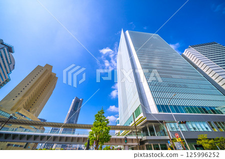 Yokohama cityscape in Japan: View of buildings including Sakuragicho Station, Yokohama City Hall, and Yokohama Landmark Tower Yokohama cityscape in Japan: View of buildings including Sakuragicho Station, Yokohama City Hall, and Yokohama Landmark Tower 125996252