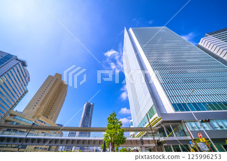 Yokohama cityscape in Japan: View of buildings including Sakuragicho Station, Yokohama City Hall, and Yokohama Landmark Tower Yokohama cityscape in Japan: View of buildings including Sakuragicho Station, Yokohama City Hall, and Yokohama Landmark Tower 125996253