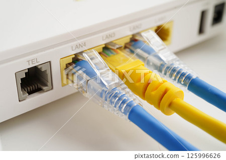 Ethernet cable with wireless router connect to internet service provider network. Ethernet cable with wireless router connect to internet service provider network. 125996626