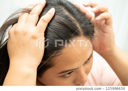 Woman with beautiful shine hair care treatment. 125996630