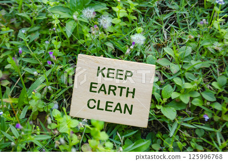 Keep Earth Clean text on wooden block with customizable space for text. For a greener tomorrow concept. Keep Earth Clean text on wooden block with customizable space for text. For a greener tomorrow concept. 125996768