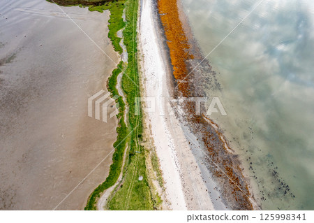 Aerial view of Ballyiriston beach by Portnoo in County Donegal - Ireland 125998341