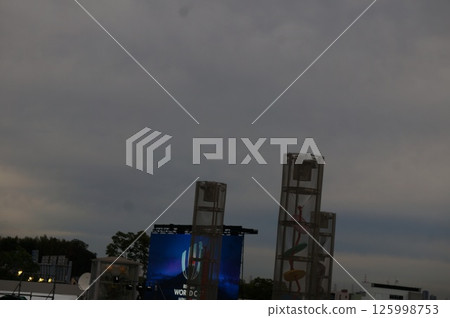The moon rising from the factory chimney 125998753
