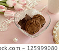 Pink roses, cookies and chocolates 125999080