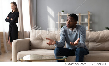 Woman Ignoring Partner's Plea, Emotional Stonewalling in Action Woman Ignoring Partner's Plea, Emotional Stonewalling in Action 125999301