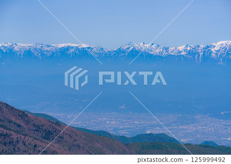 [Mountain material] View of the Zenkoji Plain from Shiga Kogen in early summer [Nagano Prefecture] 125999492