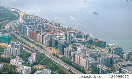 Modern Urban Waterfront District with Green Spaces and Roads 125999615