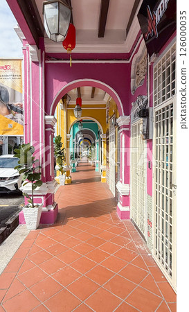 Colonial architecture in George Town, Penang, features vibrant colors and a lively vibe Colonial architecture in George Town, Penang, features vibrant colors and a lively vibe 126000035