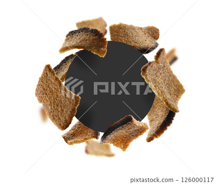 Rye croutons on a white background with a black circle in the center. The template for packaging Rye croutons on a white background with a black circle in the center. The template for packaging 126000117