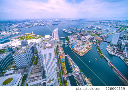 Yokohama cityscape in Japan. Four luxury cruise ships. Norwegian, Riviera, Diamond, Queen Elizabeth. Yokohama cityscape in Japan. Four luxury cruise ships. Norwegian, Riviera, Diamond, Queen Elizabeth. 126000139