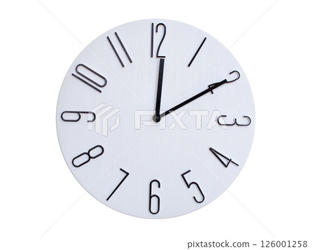 Minimalist Round Wall Clock Showing 00:10 or 12:10. Thin Black Numerals on White Wood Background. 126001258