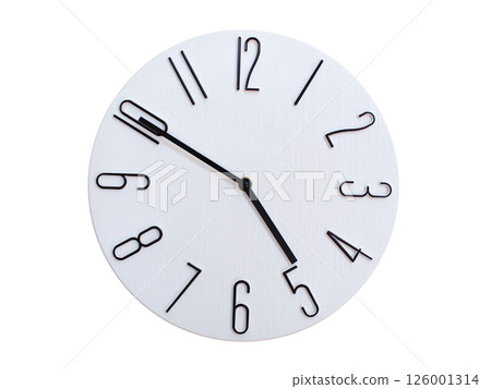 Minimalist Round Wall Clock Showing 04:50 or 16:50. Thin Black Numerals on White Wood Background. 126001314