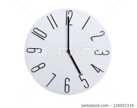 Minimalist Round Wall Clock Showing 05:00 or 17:00. Thin Black Numerals on White Wood Background. Minimalist Round Wall Clock Showing 05:00 or 17:00. Thin Black Numerals on White Wood Background. 126001316
