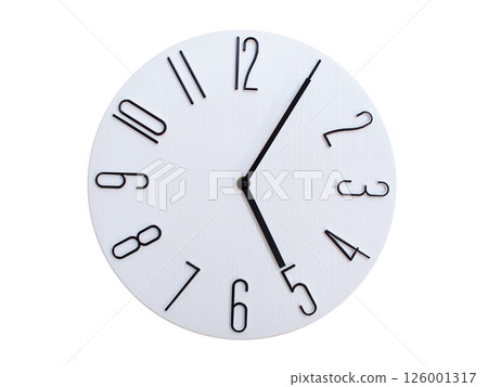 Minimalist Round Wall Clock Showing 05:05 or 17:05. Thin Black Numerals on White Wood Background. Minimalist Round Wall Clock Showing 05:05 or 17:05. Thin Black Numerals on White Wood Background. 126001317
