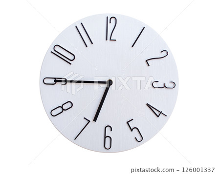 Minimalist Round Wall Clock Showing 06:45 or 18:45. Thin Black Numerals on White Wood Background. Minimalist Round Wall Clock Showing 06:45 or 18:45. Thin Black Numerals on White Wood Background. 126001337