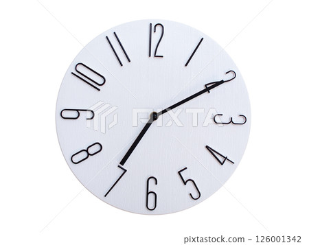 Minimalist Round Wall Clock Showing 07:10 or 19:10. Thin Black Numerals on White Wood Background. Minimalist Round Wall Clock Showing 07:10 or 19:10. Thin Black Numerals on White Wood Background. 126001342
