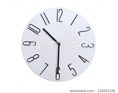 Minimalist Round Wall Clock Showing 10:30 or 22:30. Thin Black Numerals on White Wood Background. Minimalist Round Wall Clock Showing 10:30 or 22:30. Thin Black Numerals on White Wood Background. 126001386