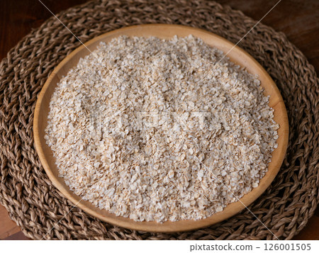 organic Instant Oatmeal or oat flakes pattern background. 126001505