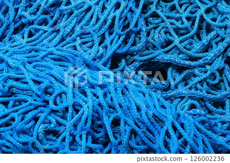 A blue, tangled mass of strings A blue, tangled mass of strings 126002236