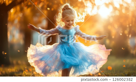 Joyful young girl in a flowing blue dress twirls with arms outstretched in a sun dappled park at golden hour, embodying childhood freedom and happiness Joyful young girl in a flowing blue dress twirls with arms outstretched in a sun dappled park at golden hour, embodying childhood freedom and happiness 126002382