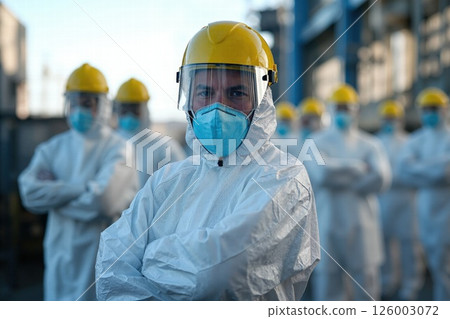 Industrial safety team in protective gear at construction site Industrial safety team in protective gear at construction site 126003072