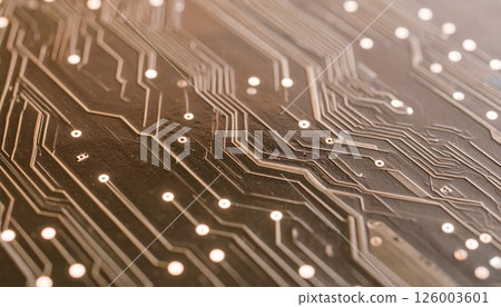 Close-up view of a modern printed circuit board showing intricate electrical pathways and tiny electronic components on a high-tech electronic device Close-up view of a modern printed circuit board showing intricate electrical pathways and tiny electronic components on a high-tech electronic device 126003601