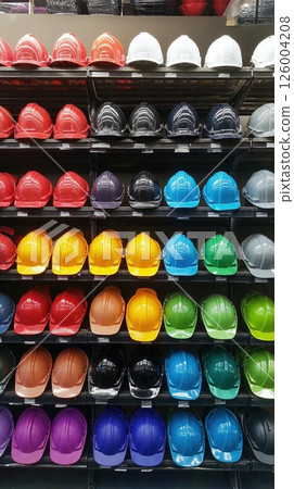 Colorful construction safety helmets display for industrial design and workplace safety inspiration 126004208