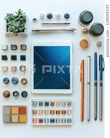 Minimalist workspace with tablet and stationery for artistic inspiration and productivity 126004335