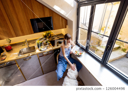 Morning Routine in a Sunny Kitchen with Dog 126004496