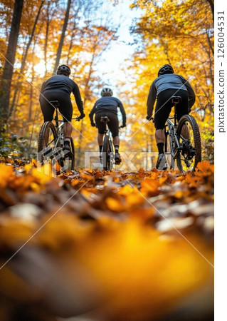 Autumn adventure cycling through vibrant woodland trails for outdoor enthusiasts and nature lovers 126004531
