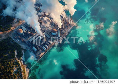 Industrial transformation and environmental impact with turquoise waters and smokestacks Industrial transformation and environmental impact with turquoise waters and smokestacks 126005107
