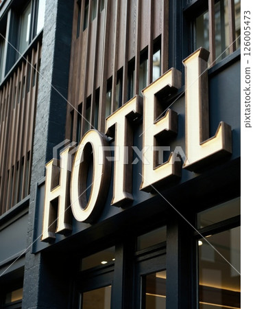 Modern boutique hotel exterior with chic signage for urban architectural design inspiration Modern boutique hotel exterior with chic signage for urban architectural design inspiration 126005473