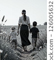 Tranquil family walk in nature, summer outdoor exploration, calm bonding moments, walking path with kids 126005632