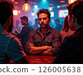 Urban nightlife vibes: stylish men socializing at trendy bar under atmospheric lighting 126005638