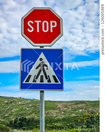 Road sign on the road: speed limit and pedestrian crossings 126005869