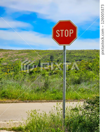 Road sign on the road: speed limit and pedestrian crossings Road sign on the road: speed limit and pedestrian crossings 126005873