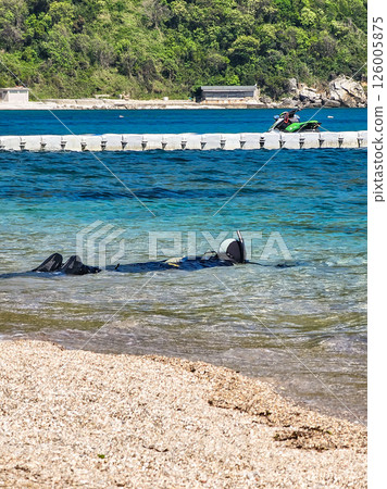 Scuba Diving Underwater Adventure with Diver Exploring Coral Reef 126005875