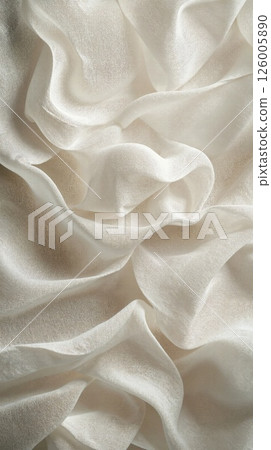 Elegant waves of silk fabric background in soft ivory tones for luxurious designs 126005890