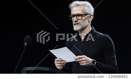 Politician giving a speech at a press conference 126006681