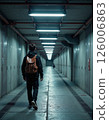 Urban exploration journey: moody underground corridor with modern industrial lighting 126006863