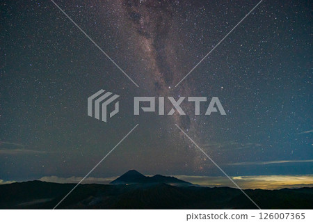 Time lapse The Milky Way stands perpendicular to the summit of Mount Bromo. 126007365
