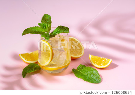 Summer refreshing drink with ice, lemon and mint. 126008654