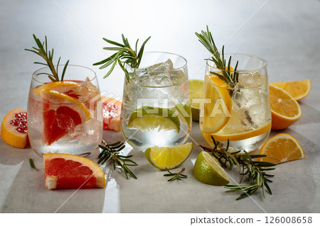 Summer refreshing drinks with ice, citrus and rosemary. Summer refreshing drinks with ice, citrus and rosemary. 126008658