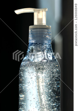 Tube of micellar gel in a ray of sunlight. Tube of micellar gel in a ray of sunlight. 126008849