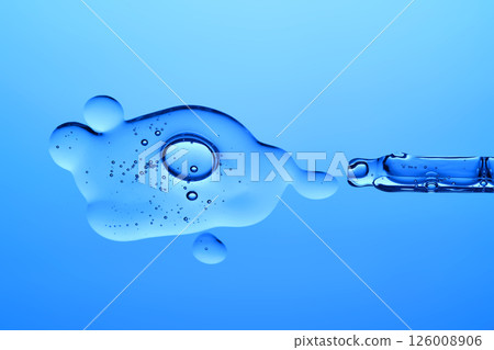 Beautiful serum texture with a pipette on a blue background. 126008906