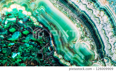 This piece features a stunning abstract green agate geode with intricate, mesmerizing patterns This piece features a stunning abstract green agate geode with intricate, mesmerizing patterns 126009909