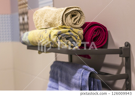 Shot of the towels on the towel holder Shot of the towels on the towel holder 126009943