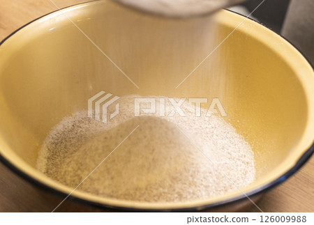 Close up shot of the sifted coarse rye flour 126009988