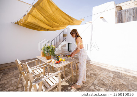 Rustic rooftop brunch under sunshade 126010036